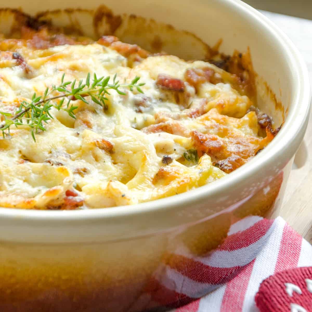 A casserole dish filled with a creamy chicken bake.